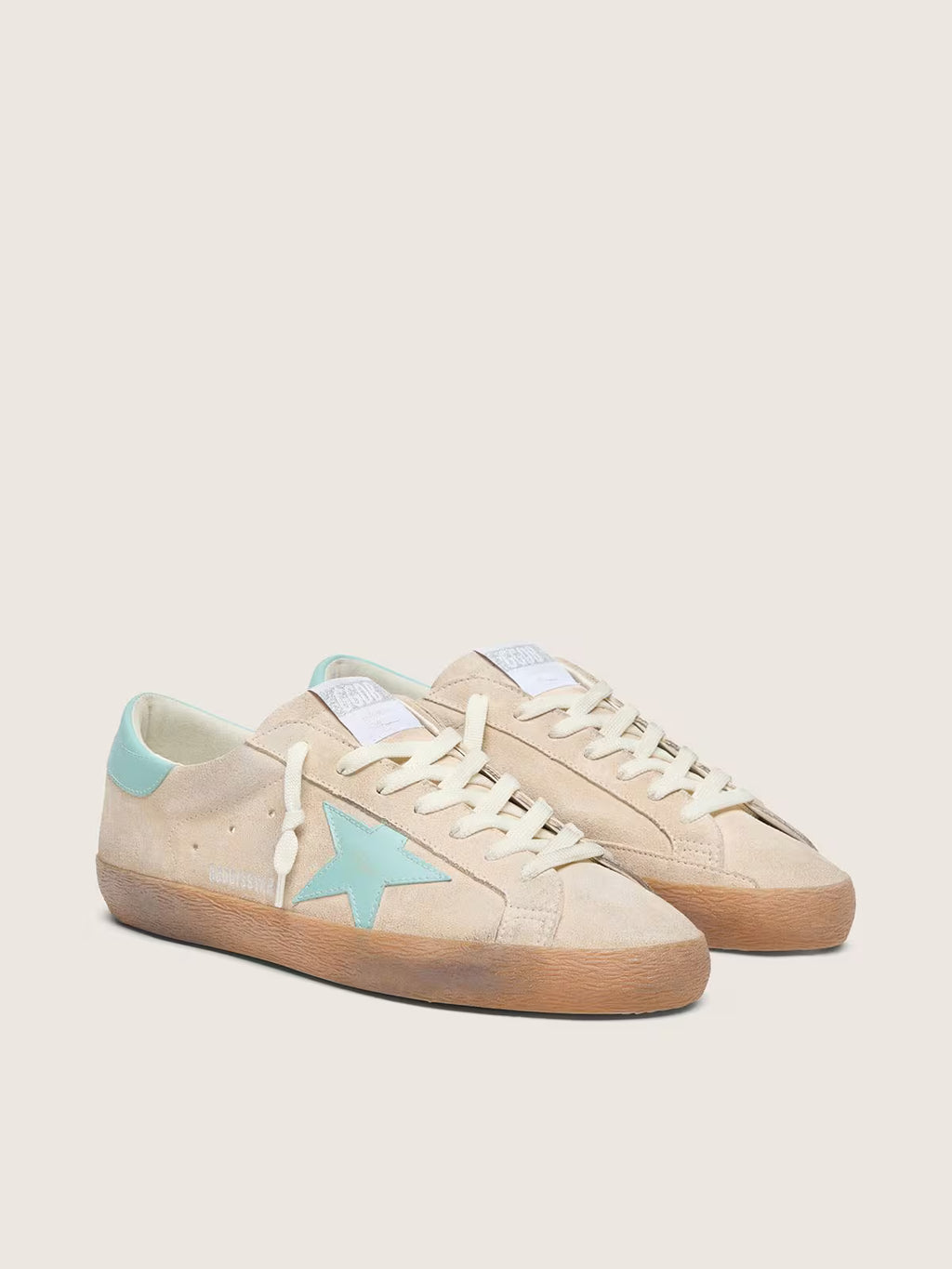Golden Goose Super-Star in beige suede with aqua-green star