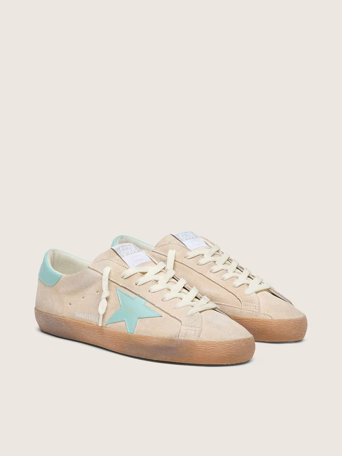 Golden Goose Super-Star in beige suede with aqua-green star