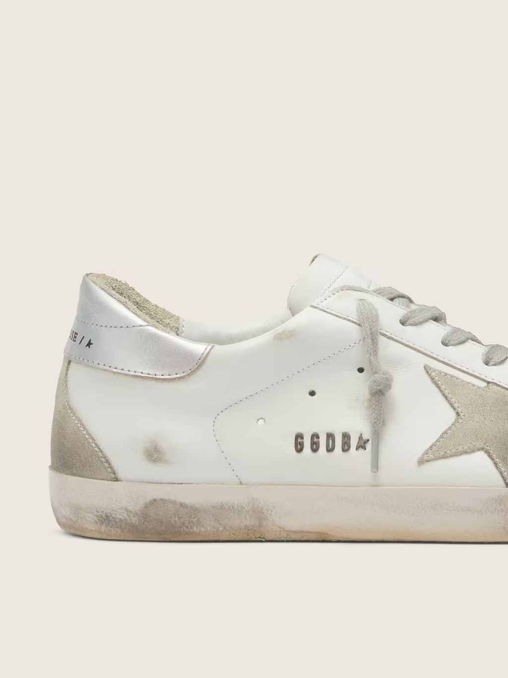 Golden Goose Super-Star with silver heel tab and lettering