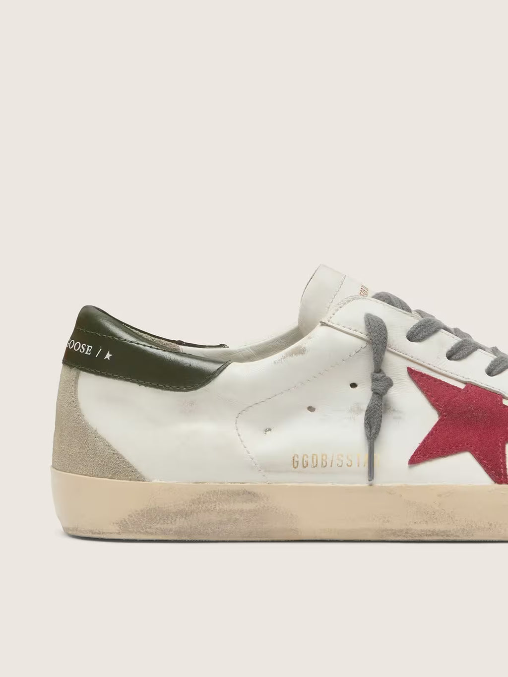 Golden Goose Super-Star with red suede star and green leather heel tab
