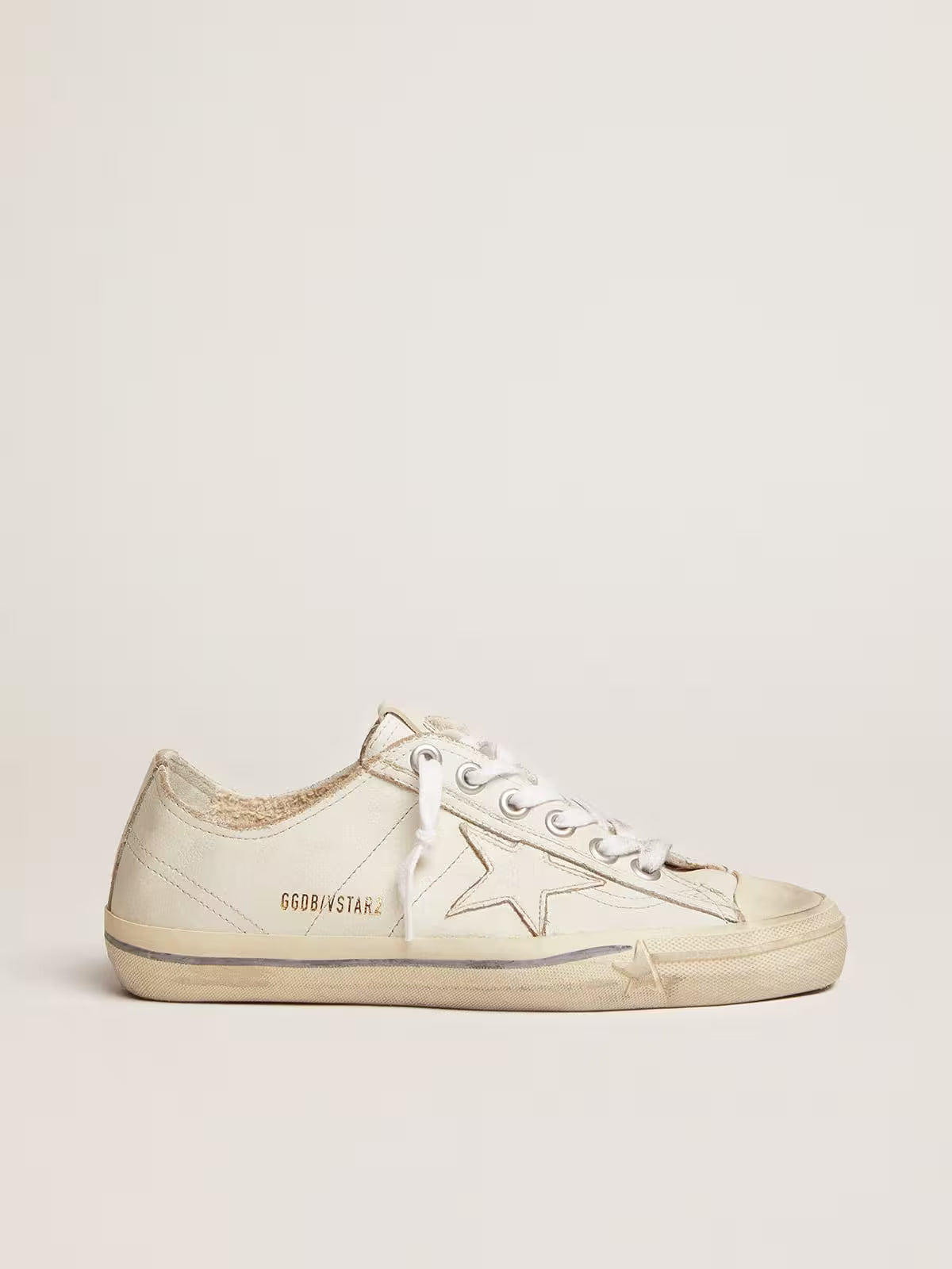 Golden Goose V-Star in white leather with white star and light blue stripe on the foxing