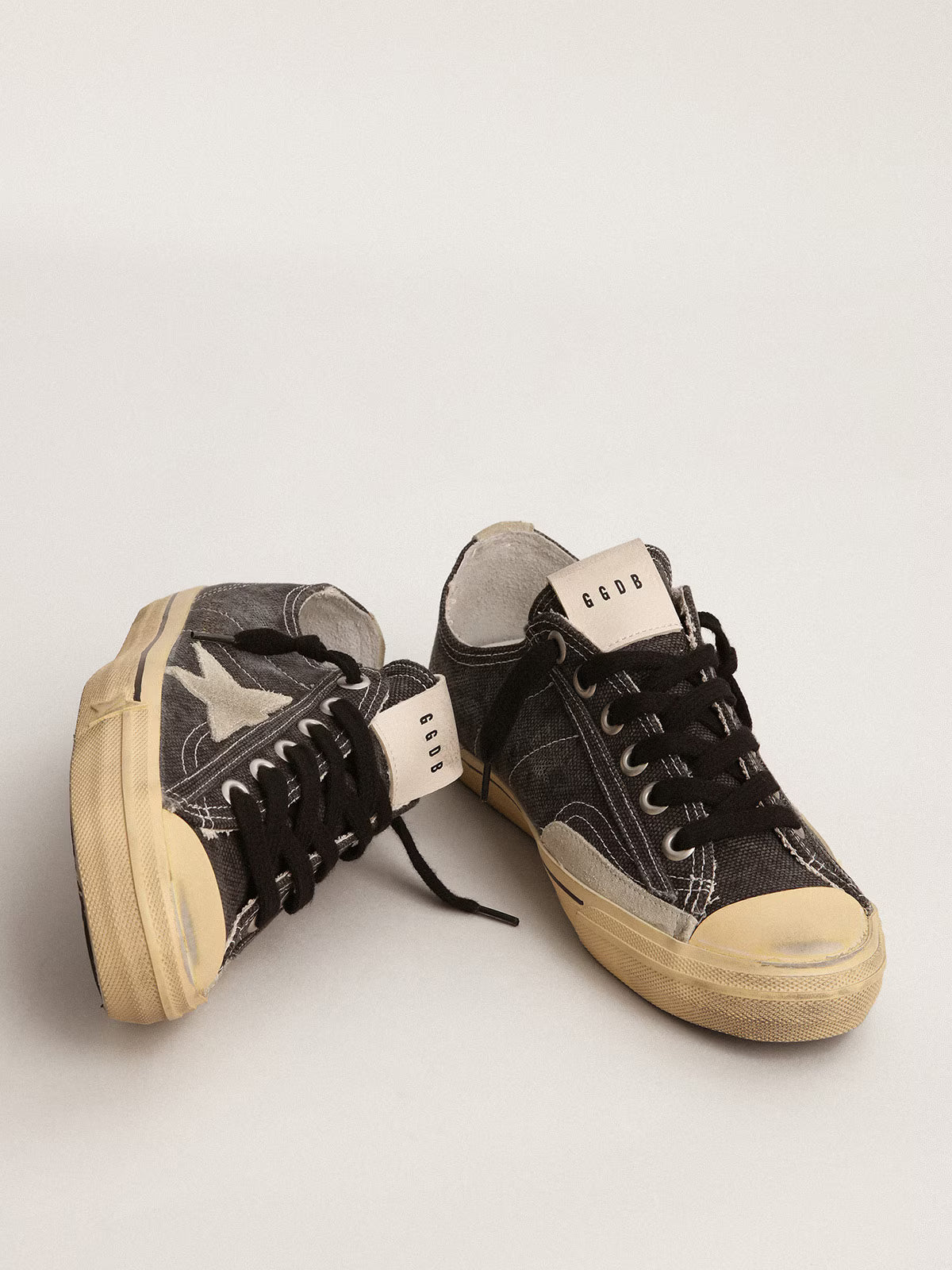 Golden Goose V-Star in black canvas with ice-gray star and heel