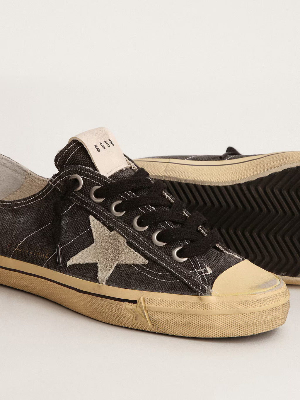 Golden Goose V-Star in black canvas with ice-gray star and heel