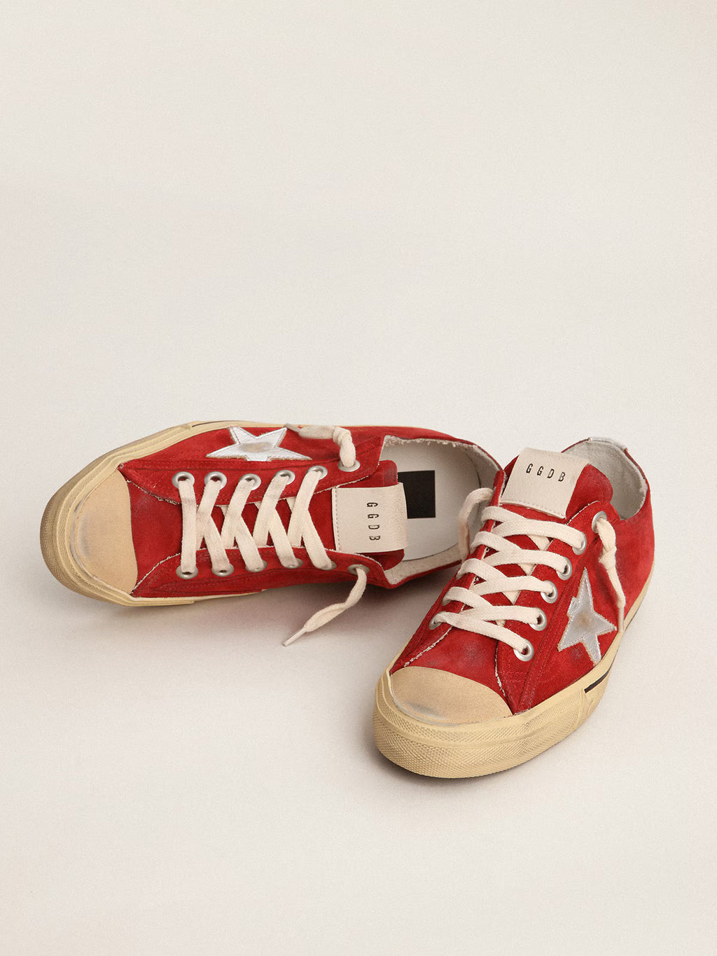 Golden Goose V-Star in dark red suede with silver star and heel tab