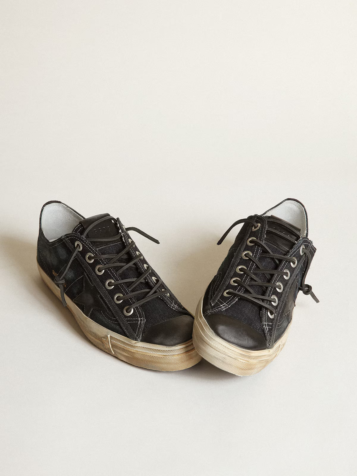 Golden Goose V-Star sneakers in midnight-blue denim with black leather star and toe