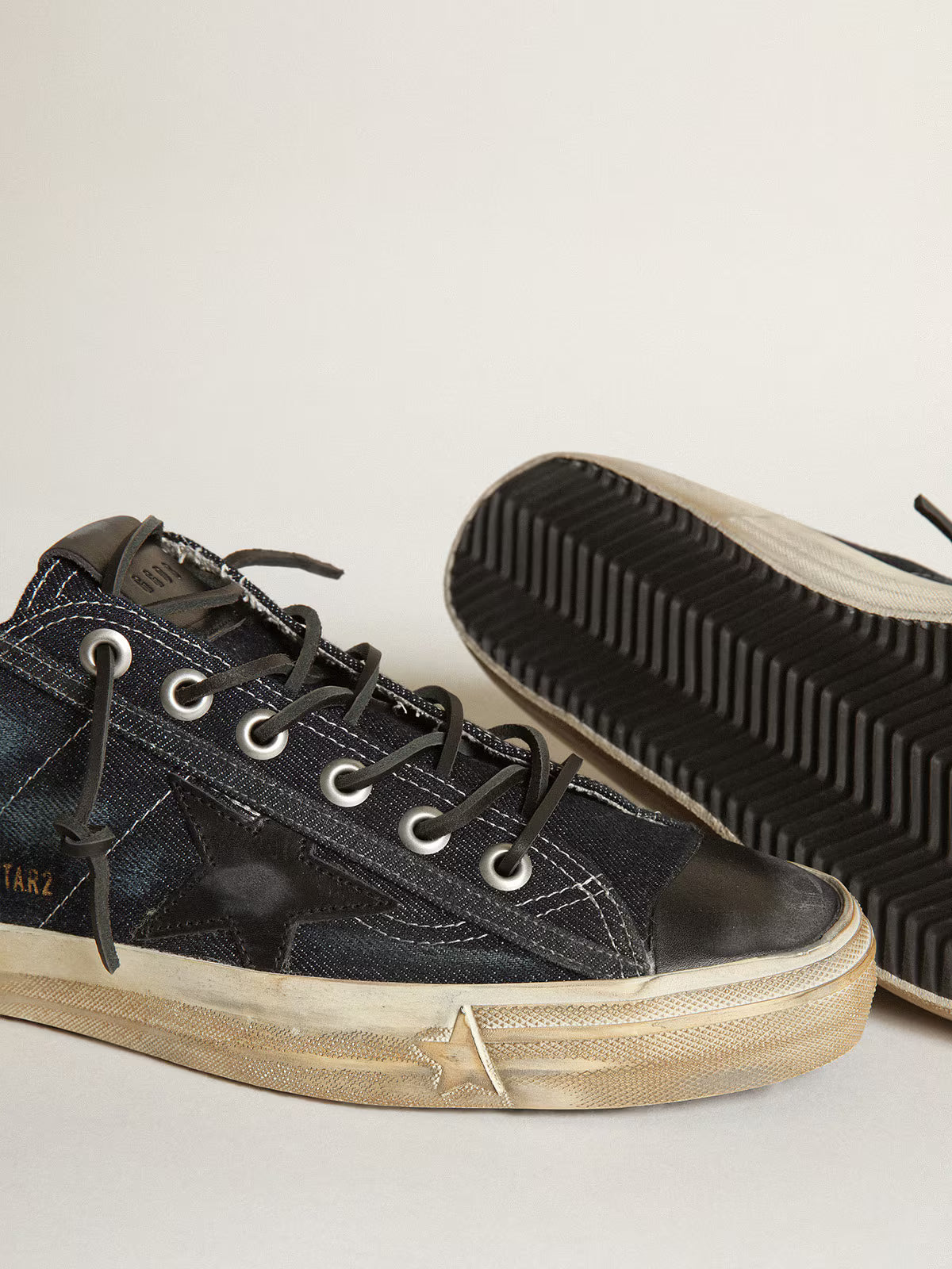 Golden Goose V-Star sneakers in midnight-blue denim with black leather star and toe