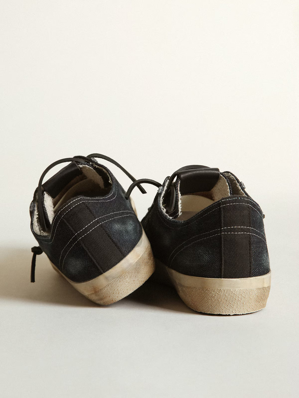 Golden Goose V-Star sneakers in midnight-blue denim with black leather star and toe