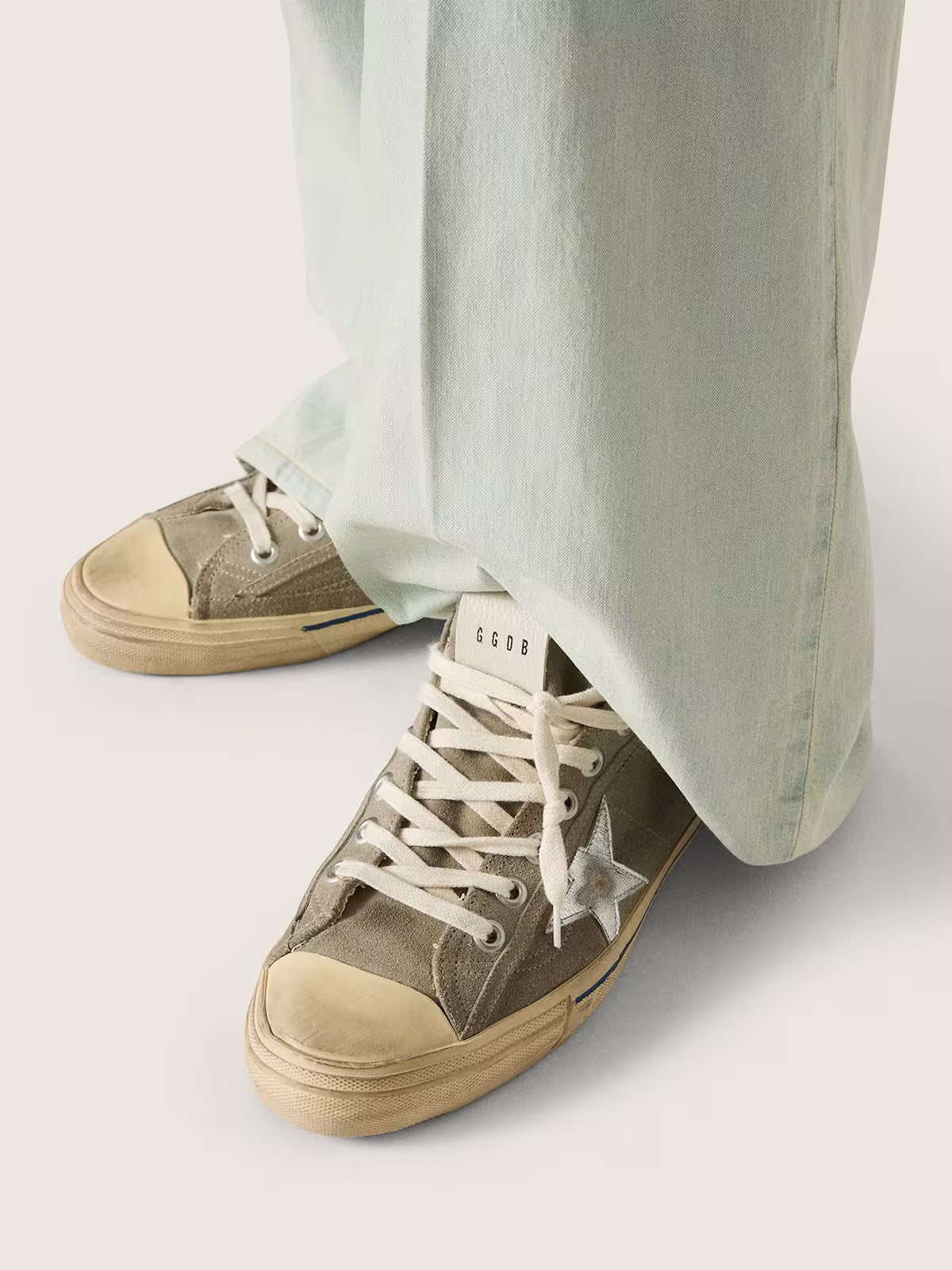Golden Goose V-Star in dove-gray suede with silver metallic leather star