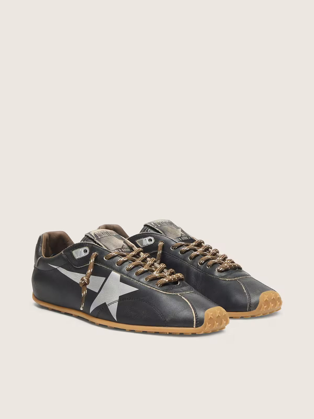 Golden Goose Marathon Speed with black leather upper and silver star