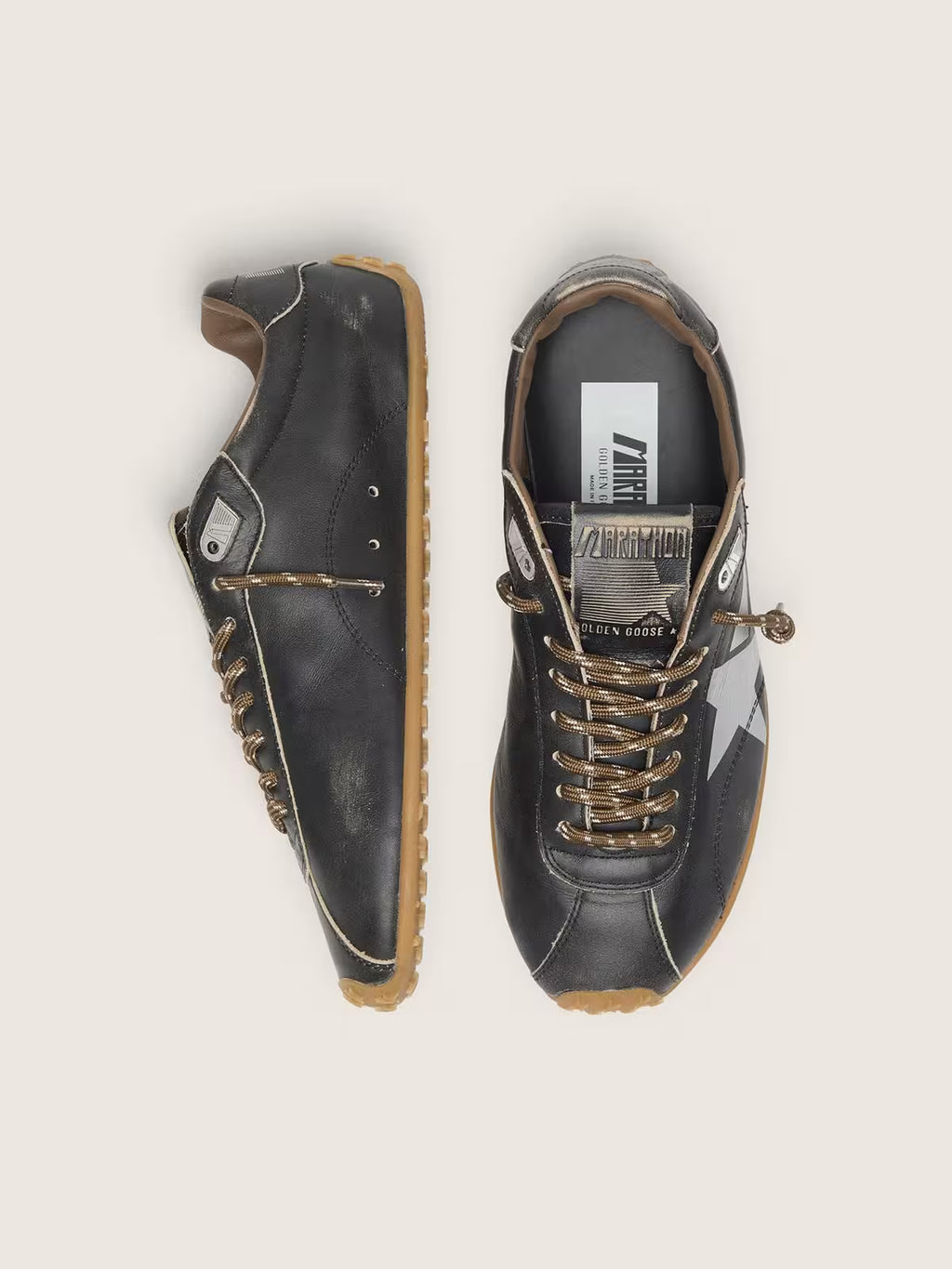 Golden Goose Marathon Speed with black leather upper and silver star