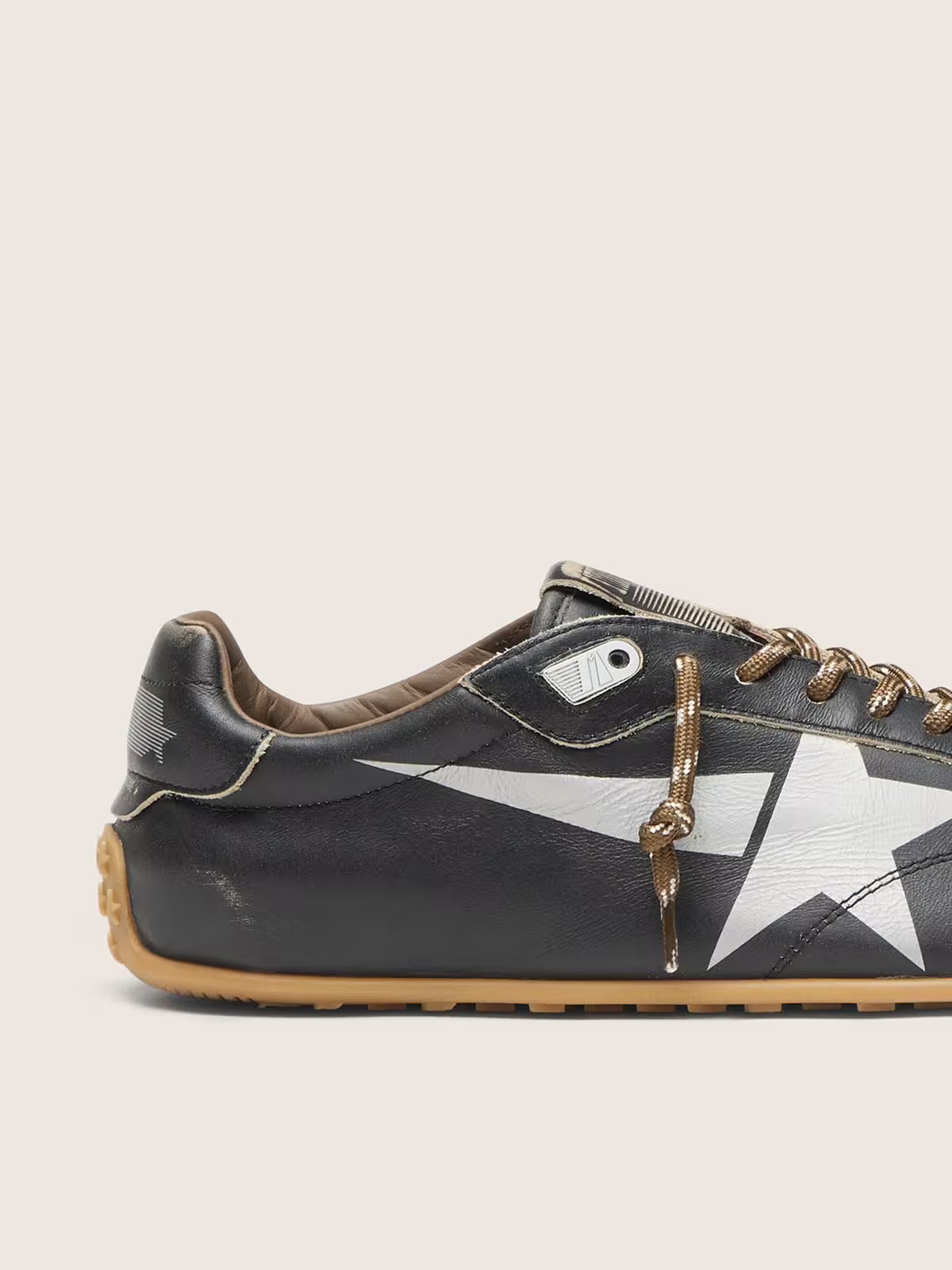 Golden Goose Marathon Speed with black leather upper and silver star