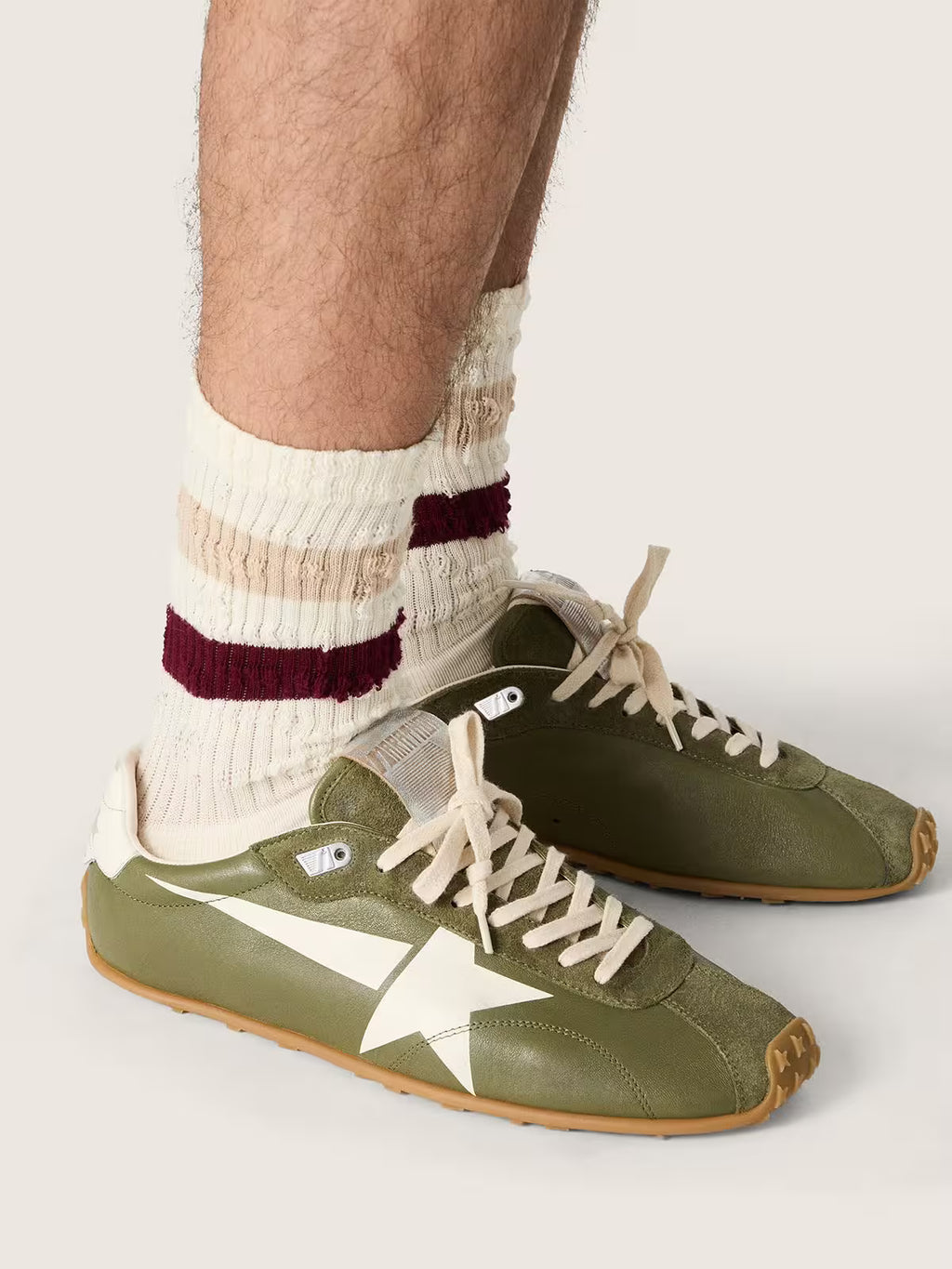 Golden Goose Marathon Speed in olive-green leather with cream star