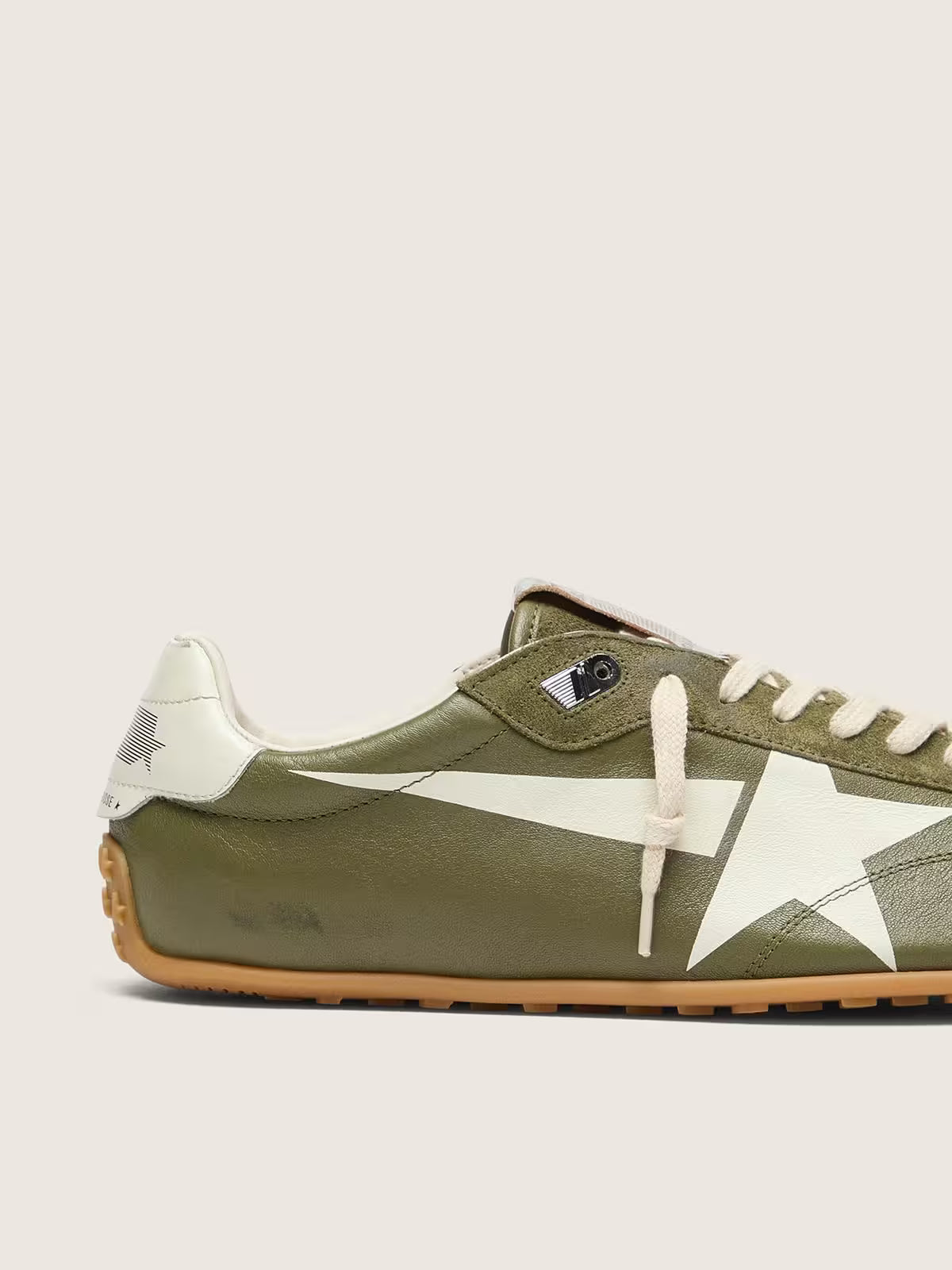 Golden Goose Marathon Speed in olive-green leather with cream star