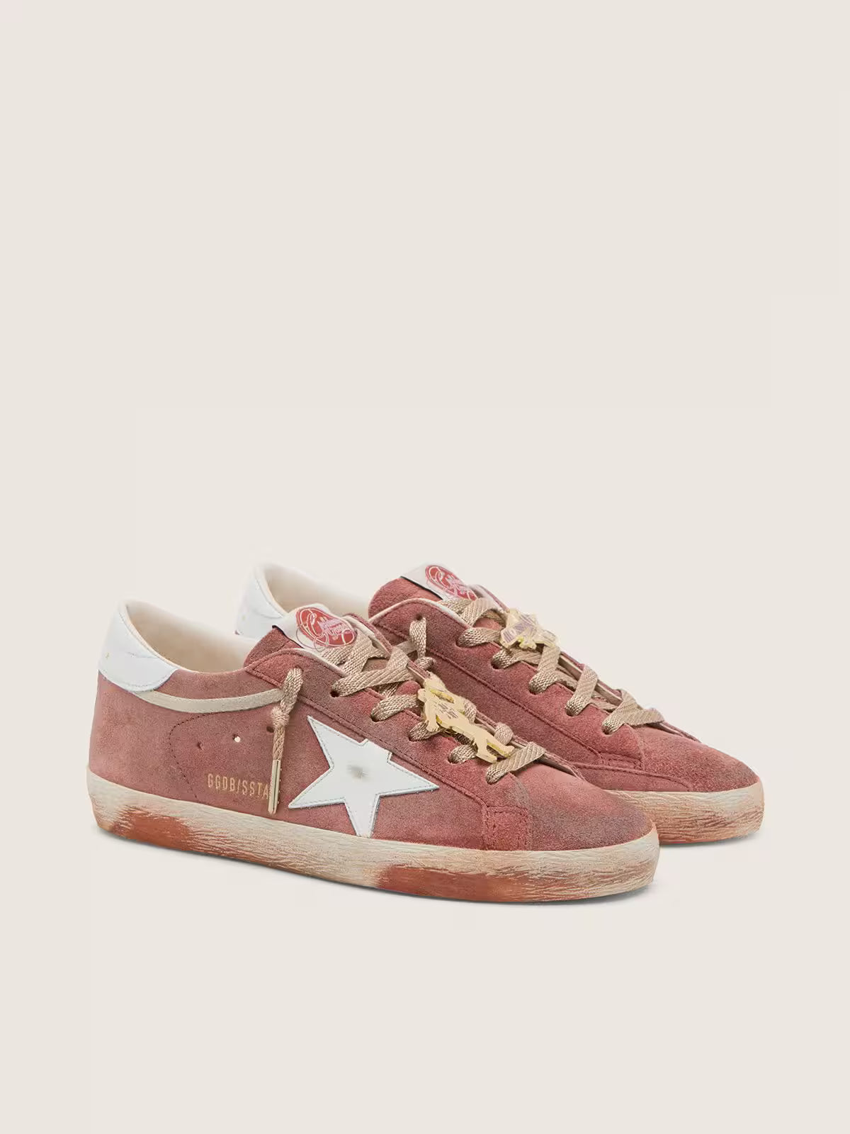 Golden Goose Super-Star in rust suede with metallic platinum leather star