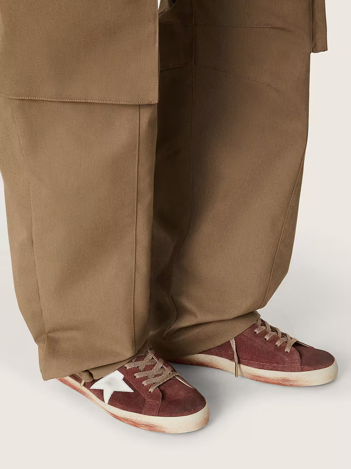 Golden Goose Super-Star in rust suede with metallic platinum leather star