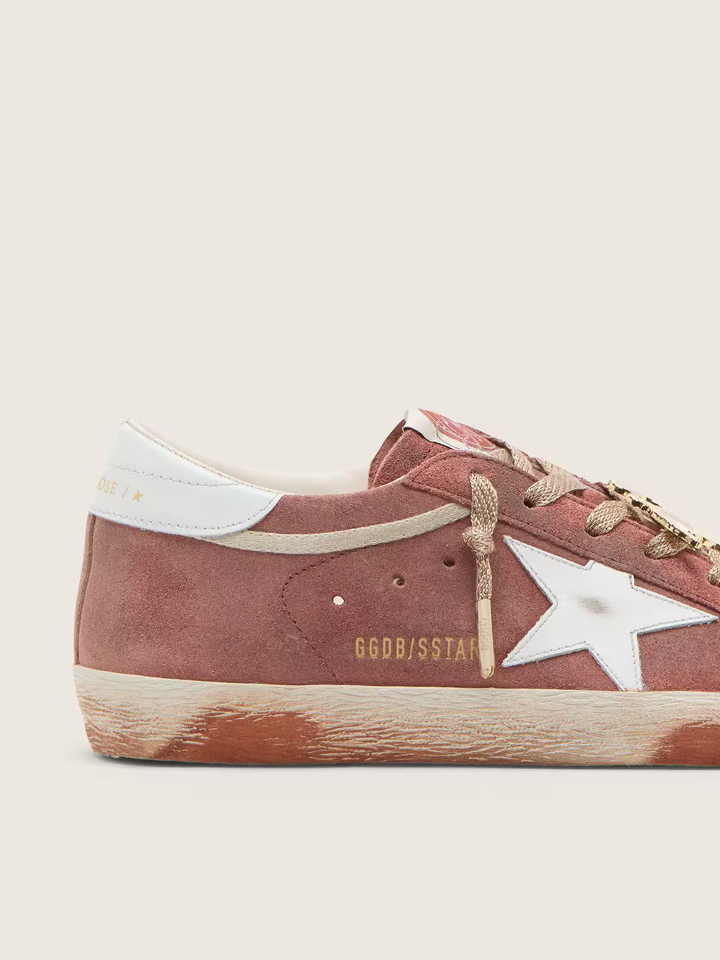 Golden Goose Super-Star in rust suede with metallic platinum leather star