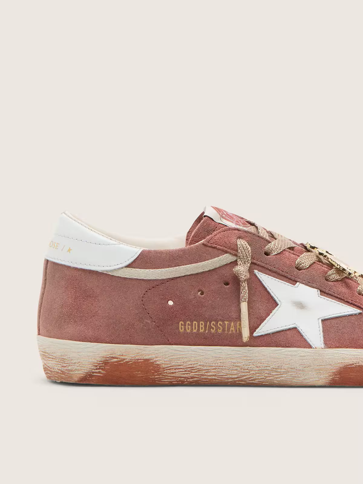 Golden Goose Super-Star in rust suede with metallic platinum leather star