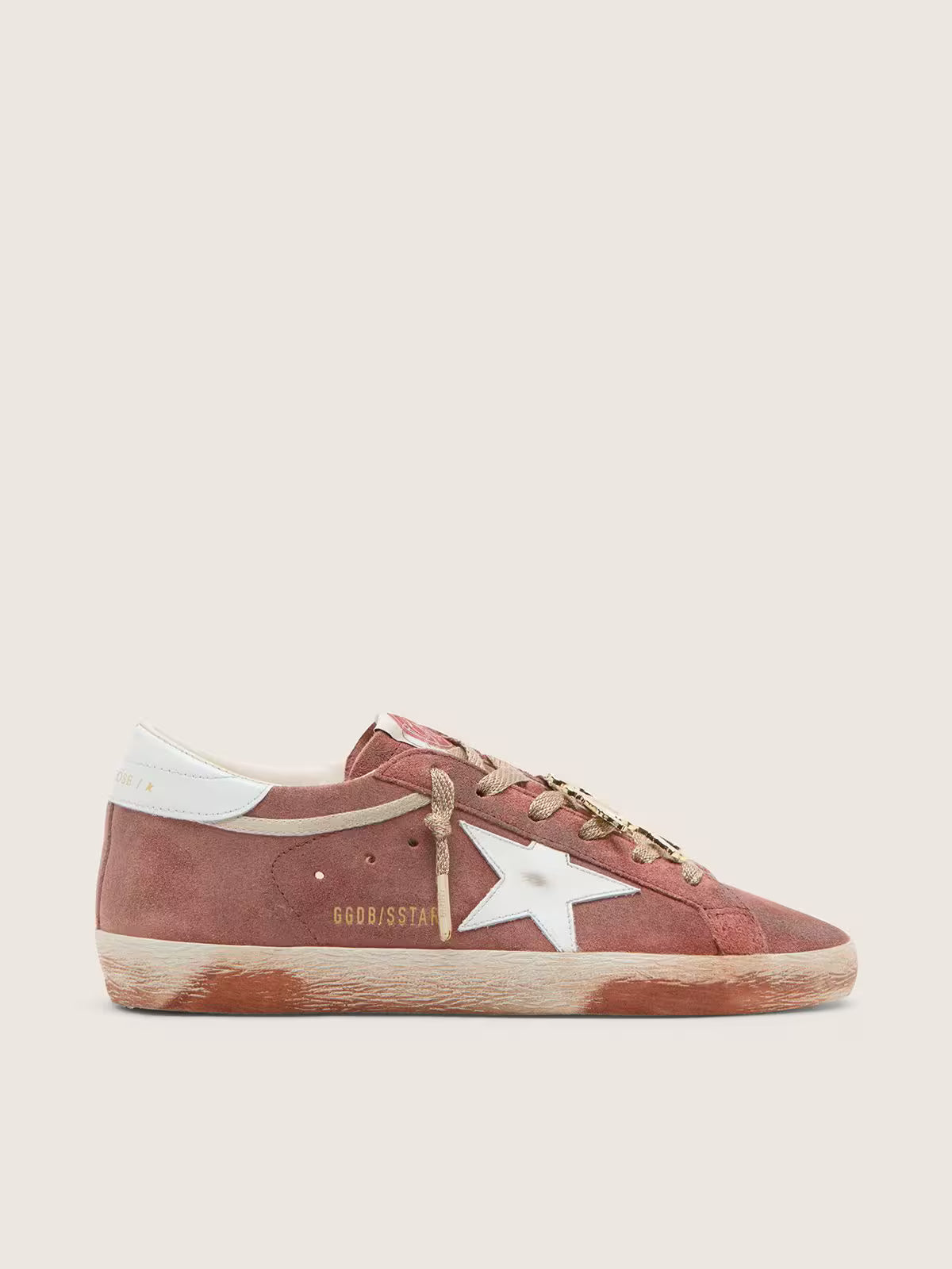 Golden Goose Super-Star in rust suede with metallic platinum leather star