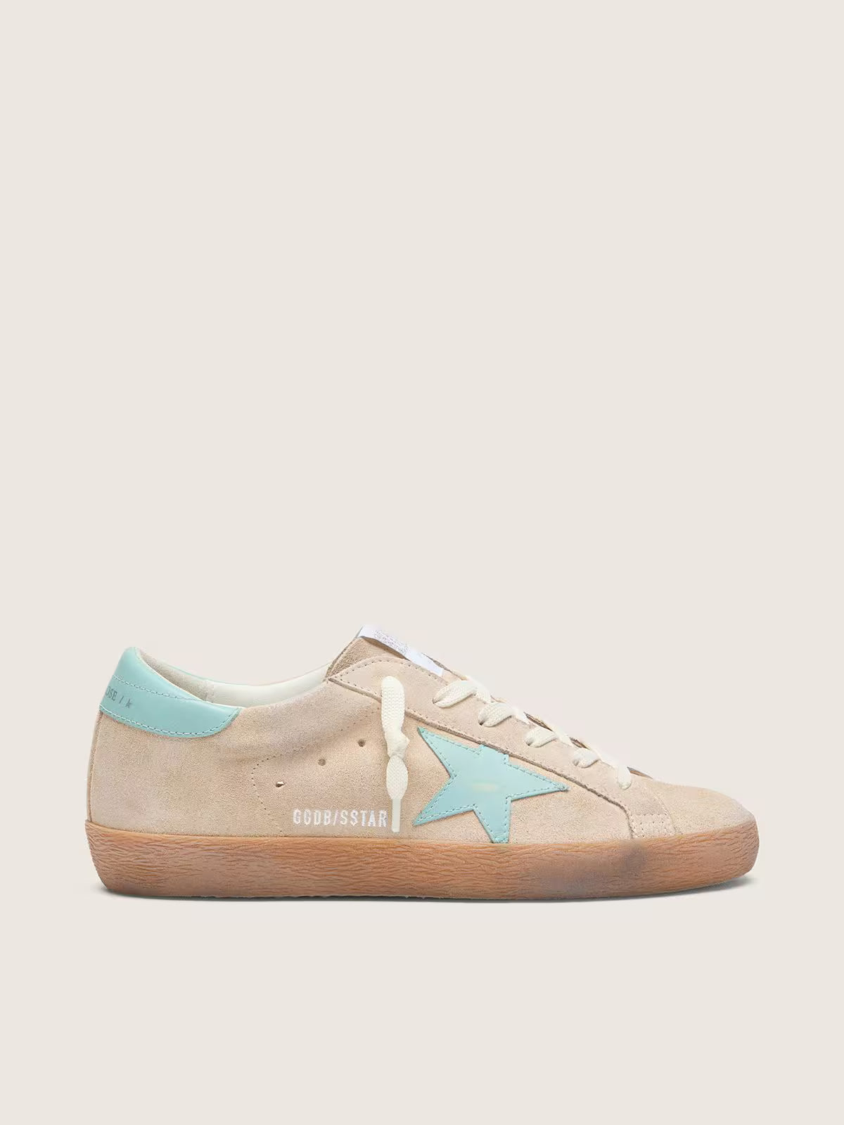 Golden Goose Super-Star in beige suede with aqua-green star