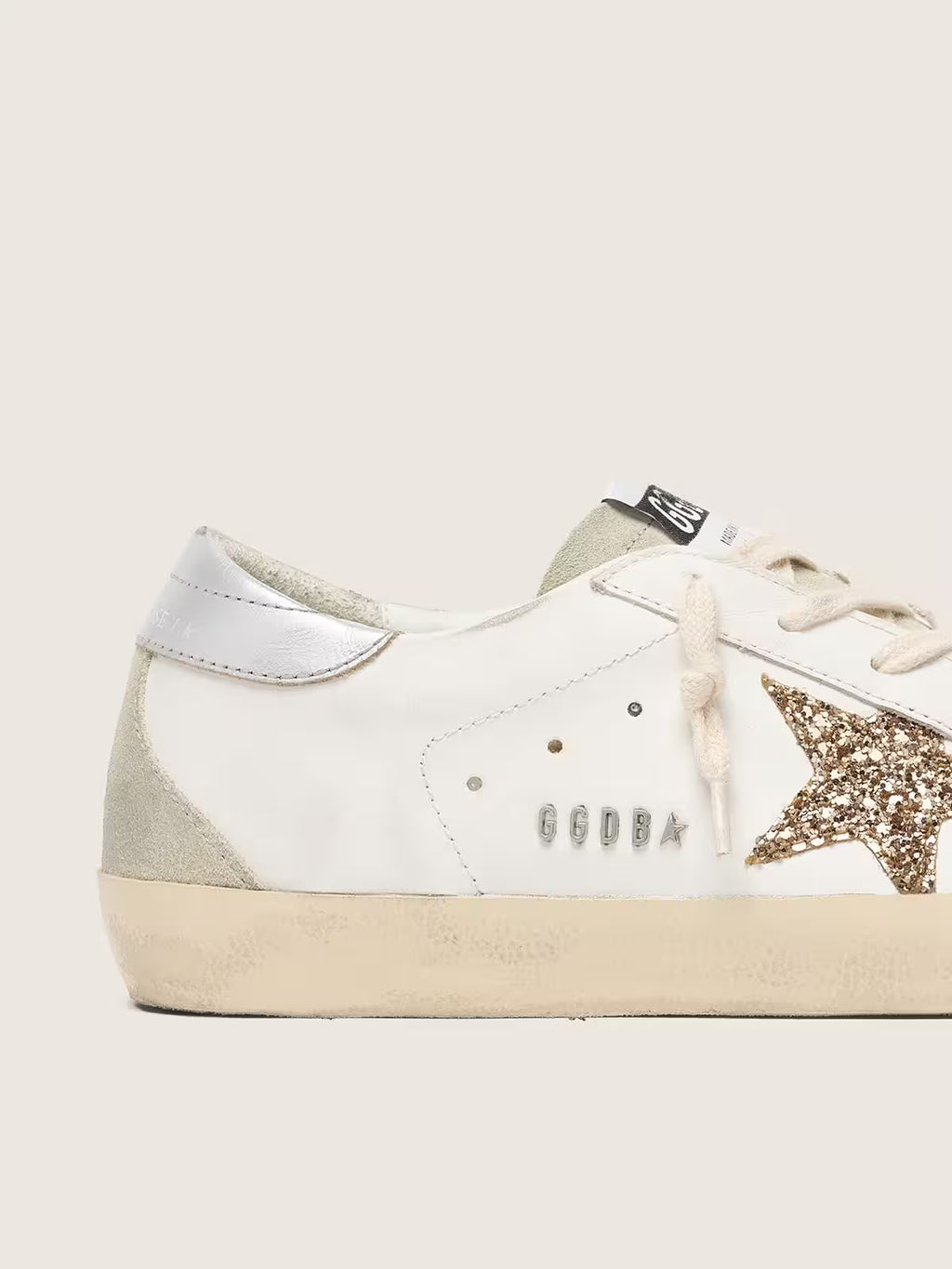 Golden Goose Super-Star with gold glitter star and ice-gray suede inserts