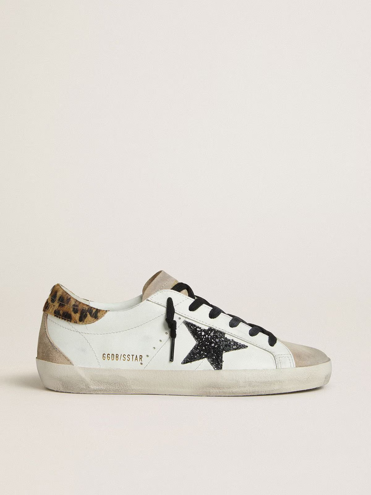Golden Goose Super-Star with black glitter star and leopard-print pony skin heel tab