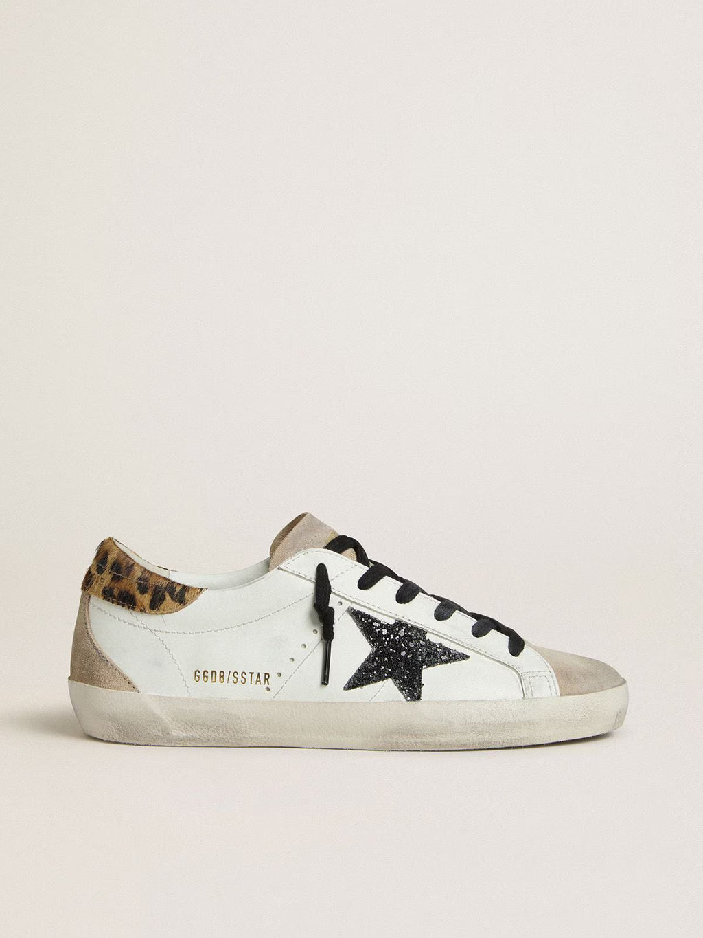 Golden Goose Super-Star with black glitter star and leopard-print pony skin heel tab