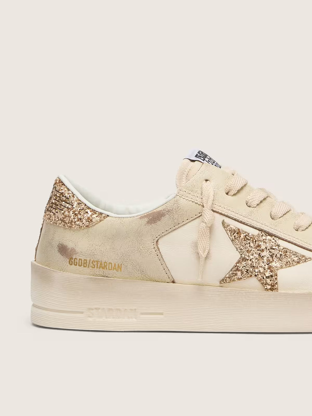 Golden Goose Stardan in ecru nappa leather with gold glitter star and heel tab